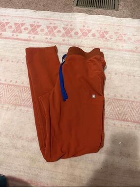 Rust Orange Drawstring scrubs with Blue Tie